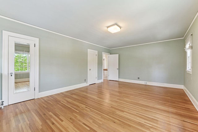 4606 Drexel Ave, Edina, MN 55424 - empty room with crown molding, light wood-type flooring, and baseboards