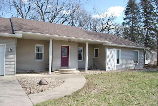 767 Shoreacres Dr, Fairmont, MN 56031 - ranch-style house with a front yard and a shingled roof