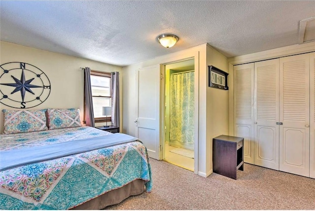 516 Park Island Rd Unit 1, Center City, MN 55012 - carpeted bedroom featuring a textured ceiling, a closet, and ensuite bath