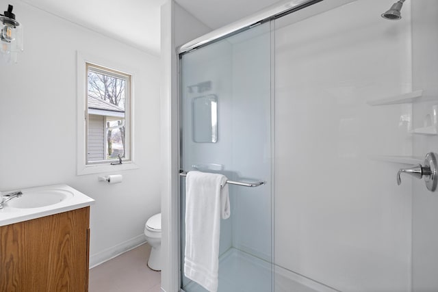 516 Park Island Rd Unit 1, Center City, MN 55012 - full bath featuring tile patterned flooring, toilet, vanity, baseboards, and a stall shower