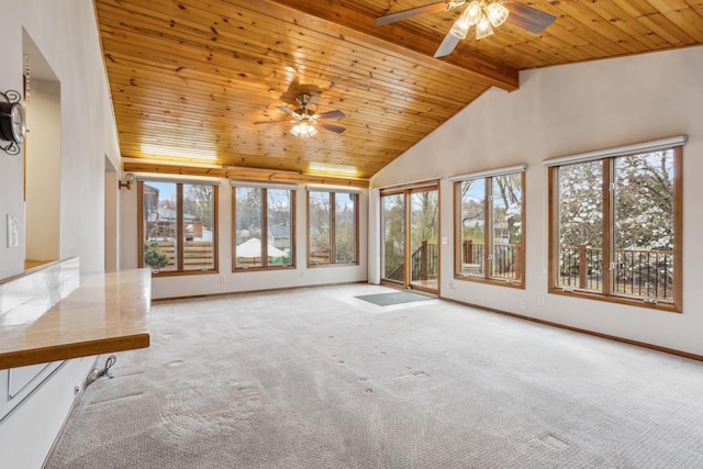 unfurnished sunroom with beamed ceiling and a wealth of natural light