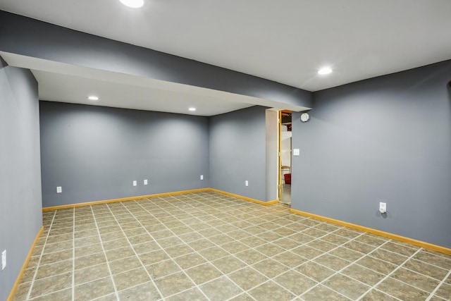finished basement with recessed lighting and baseboards