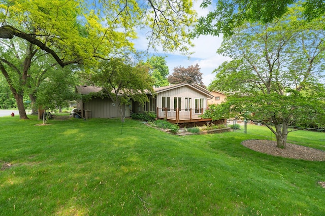 3293 Rice Creek Ter, New Brighton, MN 55112 - view of green lawn with a deck