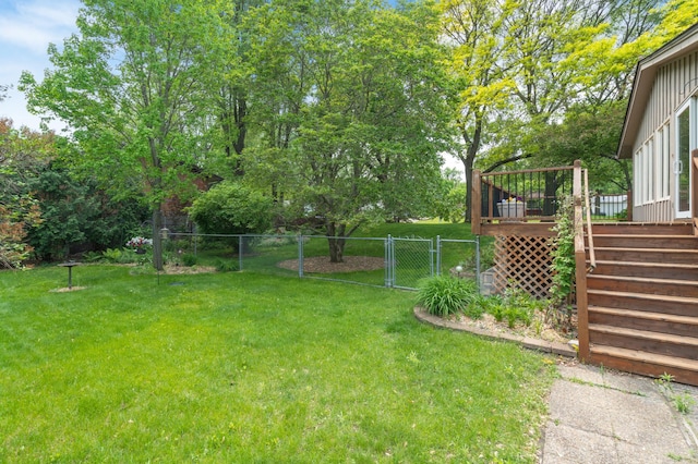 3293 Rice Creek Ter, New Brighton, MN 55112 - view of yard with a deck, a gate, and stairs