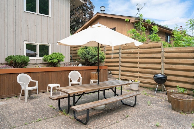 3293 Rice Creek Ter, New Brighton, MN 55112 - view of patio with outdoor dining area and grilling area