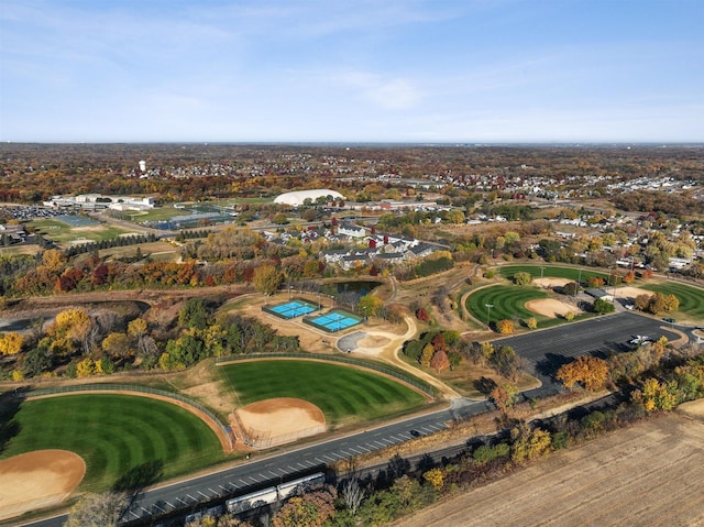birds eye view of property with golf course view