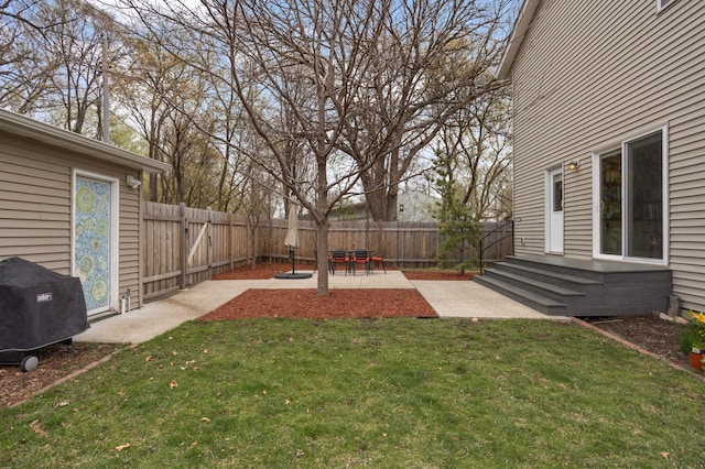 view of yard featuring a fenced backyard and a patio area