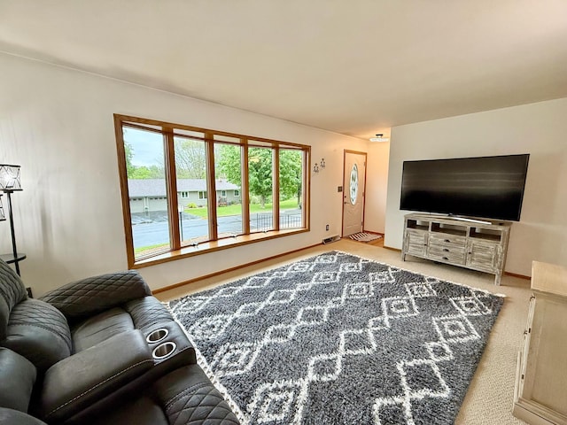 715 Crest Ln, Ellsworth, WI 54011 - living room with carpet floors and baseboards