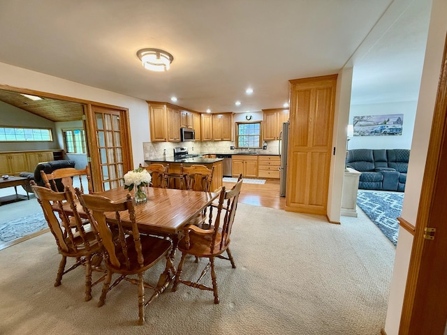 715 Crest Ln, Ellsworth, WI 54011 - dining room with light carpet and recessed lighting