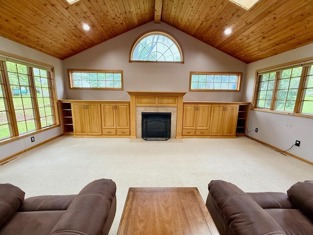 715 Crest Ln, Ellsworth, WI 54011 - living area with light colored carpet, baseboards, a fireplace, lofted ceiling, and plenty of natural light