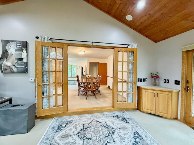 715 Crest Ln, Ellsworth, WI 54011 - entryway with lofted ceiling, wood ceiling, french doors, and recessed lighting