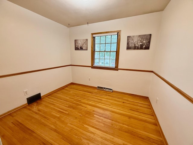 715 Crest Ln, Ellsworth, WI 54011 - empty room featuring light wood-style floors and baseboards