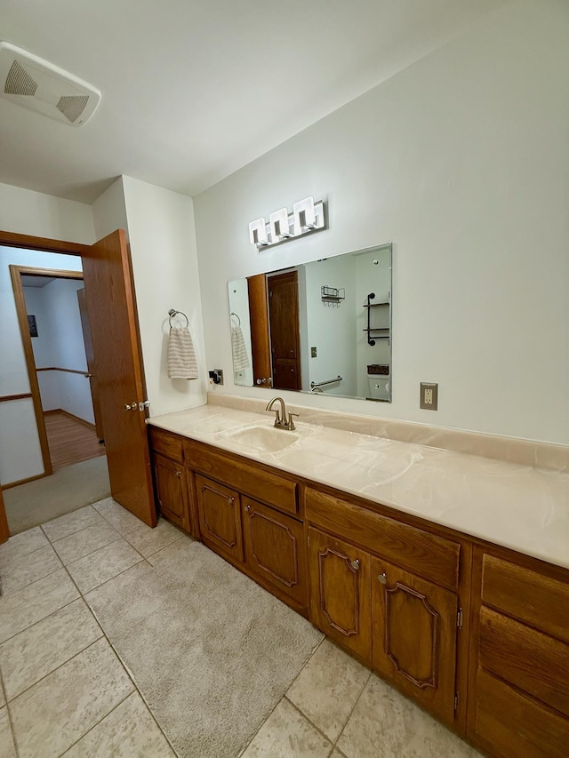 715 Crest Ln, Ellsworth, WI 54011 - bathroom featuring tile patterned flooring and vanity