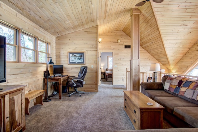 carpeted office space featuring lofted ceiling, wooden walls, a ceiling fan, and wooden ceiling