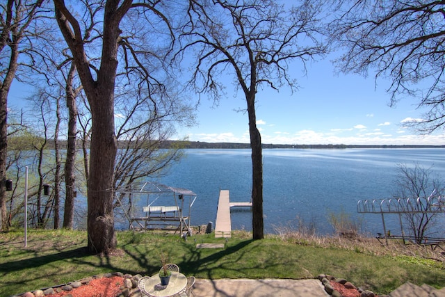 view of water feature with a dock