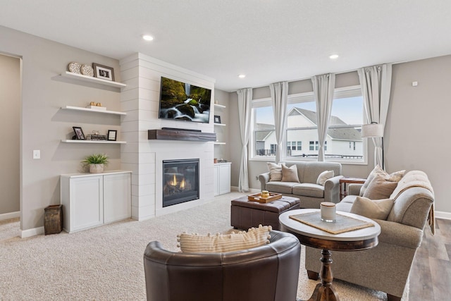 7393 Emily Cir, Lino Lakes, MN 55038 - carpeted living room with baseboards, a fireplace, and recessed lighting