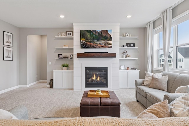 7393 Emily Cir, Lino Lakes, MN 55038 - carpeted living room featuring a fireplace, baseboards, and recessed lighting
