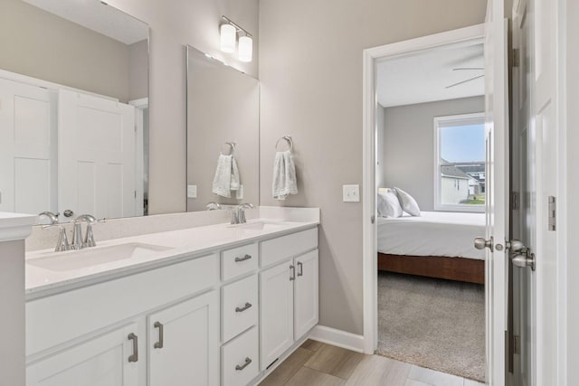 7393 Emily Cir, Lino Lakes, MN 55038 - ensuite bathroom with baseboards, ensuite bath, double vanity, and a sink