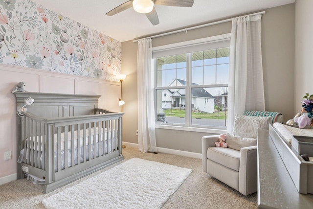 7393 Emily Cir, Lino Lakes, MN 55038 - bedroom with carpet flooring, a nursery area, baseboards, and a ceiling fan