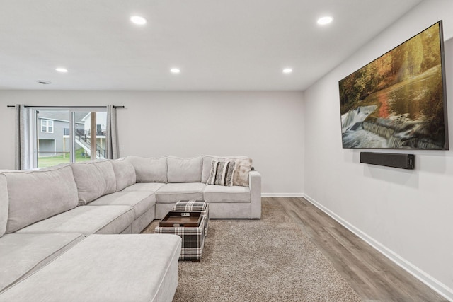 7393 Emily Cir, Lino Lakes, MN 55038 - living area featuring wood finished floors, baseboards, and recessed lighting