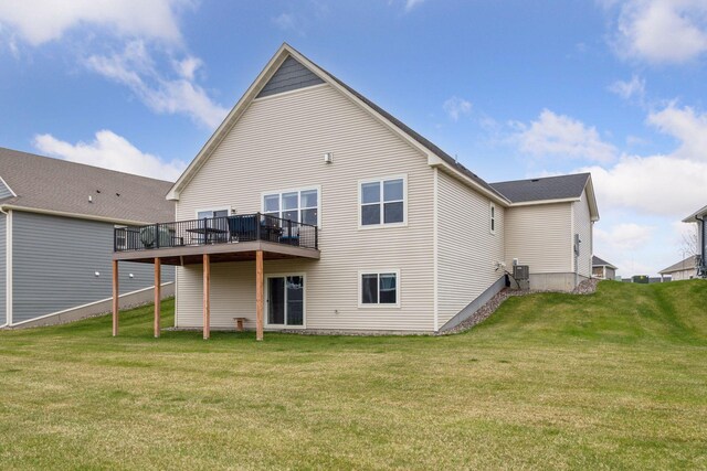 7393 Emily Cir, Lino Lakes, MN 55038 - rear view of house featuring a deck and a lawn