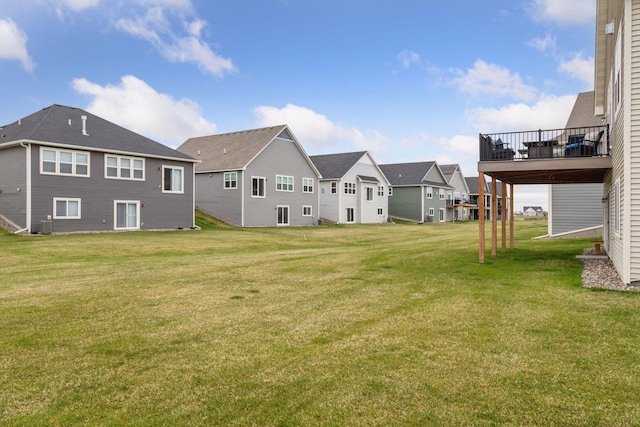 7393 Emily Cir, Lino Lakes, MN 55038 - view of yard featuring central air condition unit, a residential view, and a deck