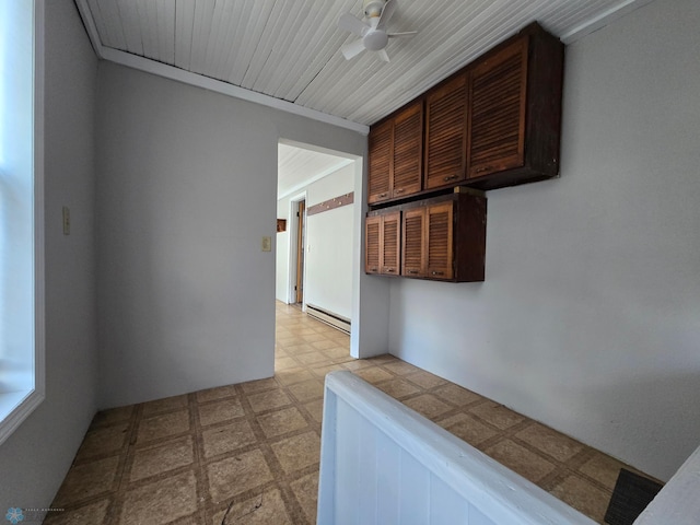 hall with light floors and a baseboard radiator