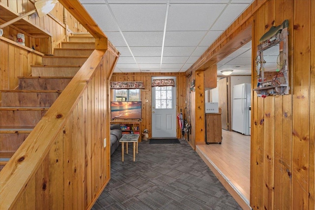 822 138th St Unit 32, Garfield Twp, WI 54001 - interior space featuring a paneled ceiling, stairs, and wooden walls