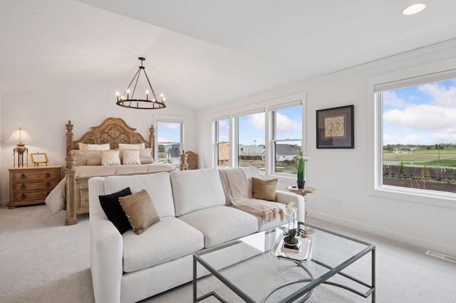 bedroom with baseboards, light carpet, a notable chandelier, and visible vents