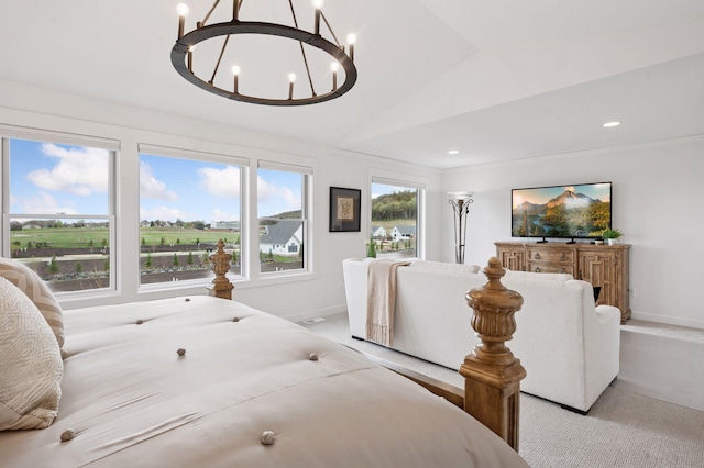 bedroom featuring baseboards, lofted ceiling, a notable chandelier, and light carpet