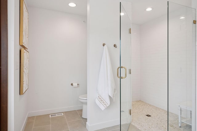 bathroom with tile patterned flooring, toilet, recessed lighting, a shower stall, and visible vents