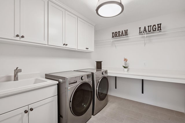 2301 Simply Living Ln, Hudson, WI 54016 - laundry room with cabinet space and washer and clothes dryer