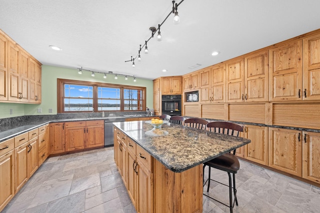 63626 Hannu Ln, Finlayson, MN 55735 - kitchen featuring dishwasher, a kitchen bar, a center island, dark stone counters, and recessed lighting