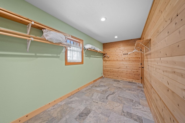 63626 Hannu Ln, Finlayson, MN 55735 - walk in closet featuring stone finish flooring