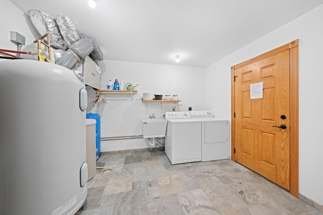 63626 Hannu Ln, Finlayson, MN 55735 - laundry room with separate washer and dryer, water heater, and stone finish floors