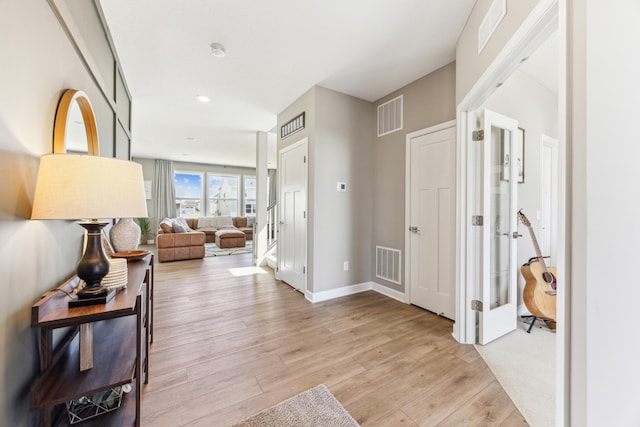 2133 Johanna Cir, Lino Lakes, MN 55038 - hallway with light wood-style floors and baseboards