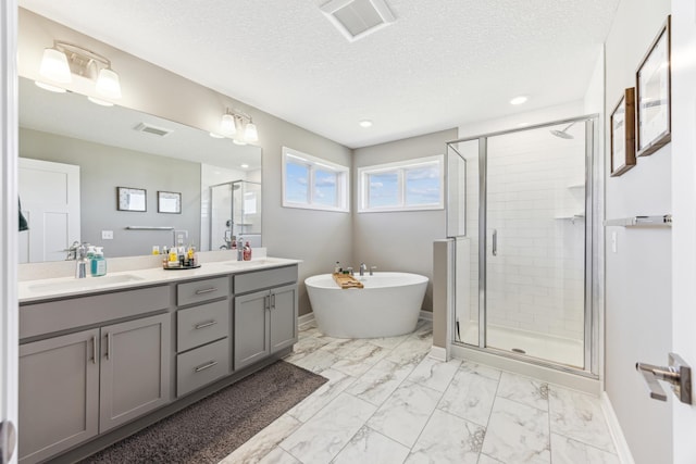 2133 Johanna Cir, Lino Lakes, MN 55038 - bathroom featuring a stall shower, marble finish flooring, a soaking tub, double vanity, and baseboards