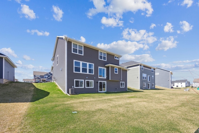2133 Johanna Cir, Lino Lakes, MN 55038 - back of house with a lawn and a residential view