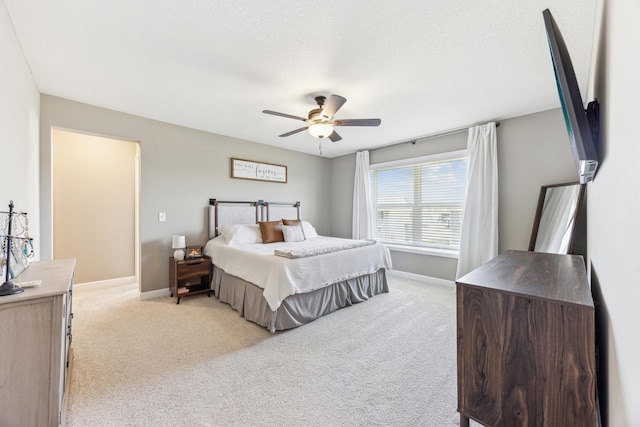 2133 Johanna Cir, Lino Lakes, MN 55038 - bedroom featuring light carpet, baseboards, and a ceiling fan
