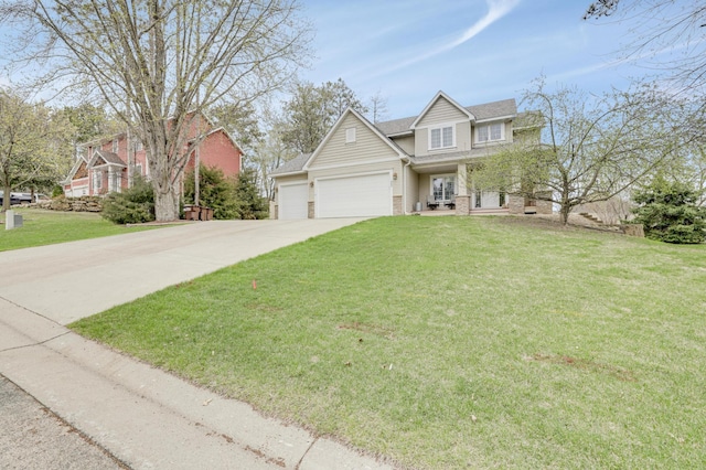 562 Hillside Dr, Prescott, WI 54021 - view of front facade with concrete driveway, an attached garage, a front yard, brick siding, and roof with shingles