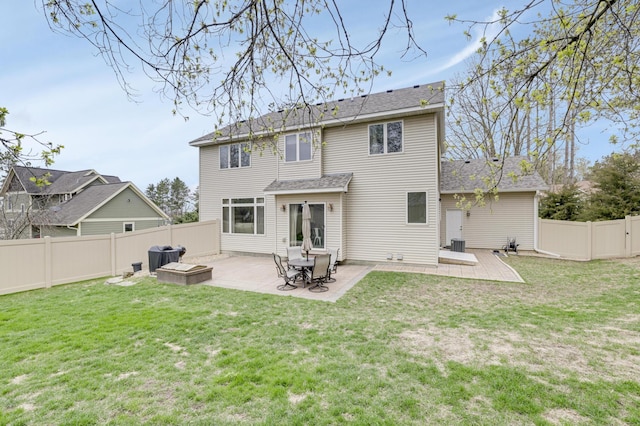 562 Hillside Dr, Prescott, WI 54021 - back of house with a patio and a shingled roof