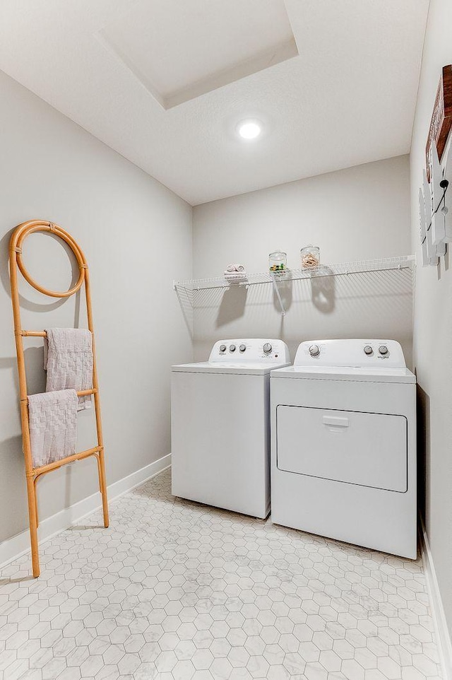 19454 136th Ave N, Rogers, MN 55374 - clothes washing area featuring recessed lighting, washer and clothes dryer, laundry area, and baseboards