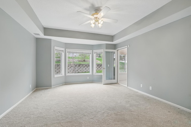 5541 70th St, Edina, MN 55439 - carpeted empty room featuring a ceiling fan, healthy amount of natural light, and baseboards