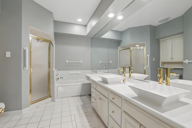 5541 70th St, Edina, MN 55439 - bathroom featuring a shower stall, tile patterned floors, a garden tub, double vanity, and recessed lighting