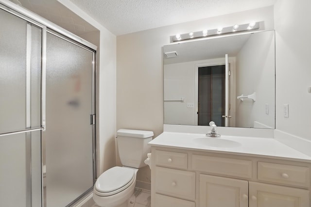 5541 70th St, Edina, MN 55439 - bathroom featuring toilet, a stall shower, vanity, and a textured ceiling