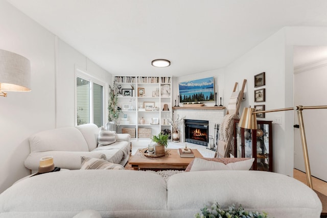 living area featuring a fireplace