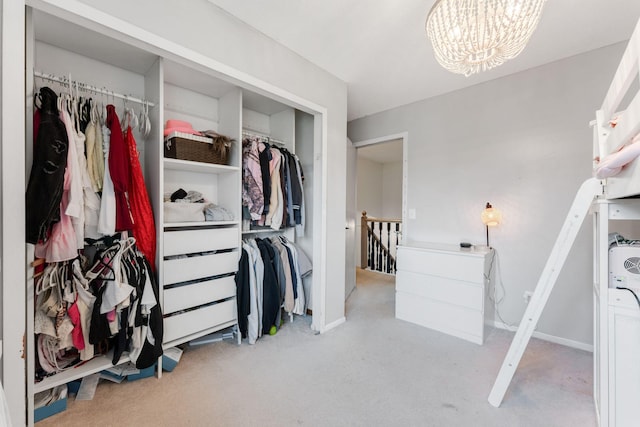 bedroom featuring an inviting chandelier and carpet flooring