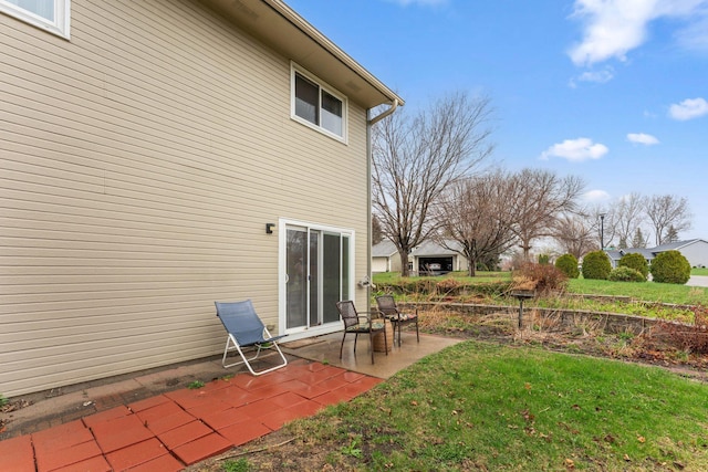 rear view of property with a patio area and a yard