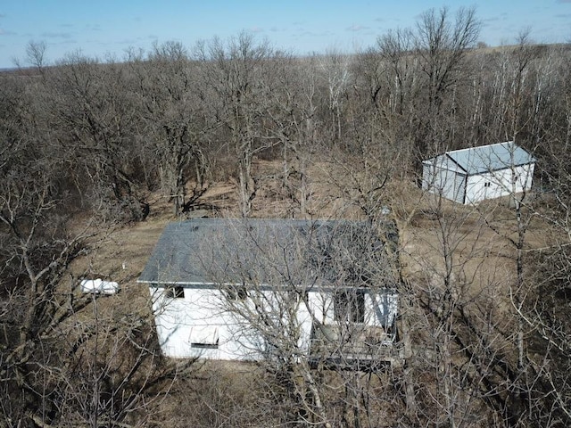drone / aerial view with a forest view