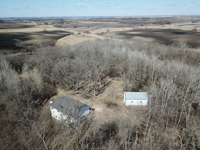 birds eye view of property with a rural view